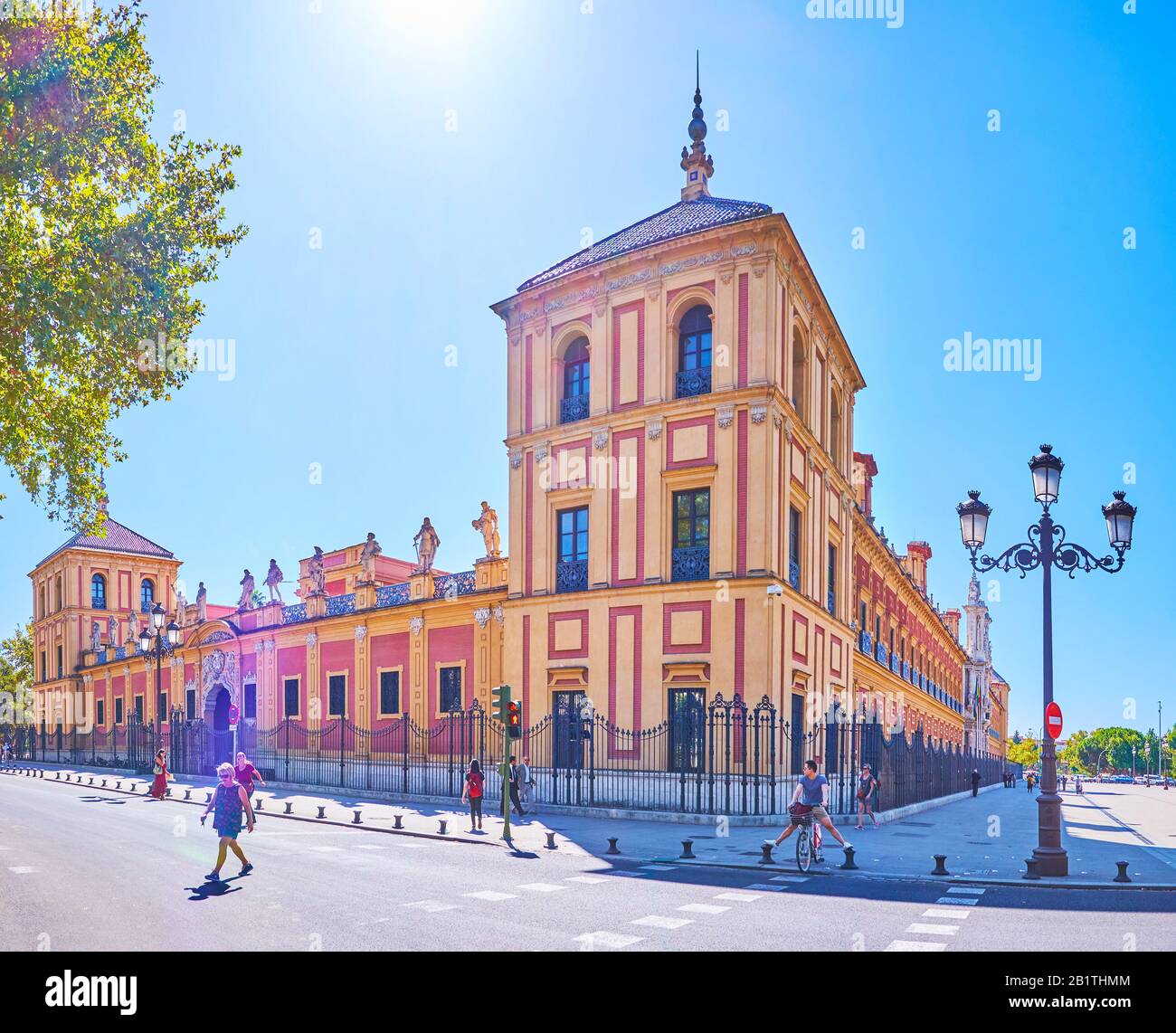 SEVILLE, SPAIN - OCTOBER 1, 2019: Palace of San Telmo with its amazing side facade with sculptures atop the central part, named the Gallery of illustr Stock Photo