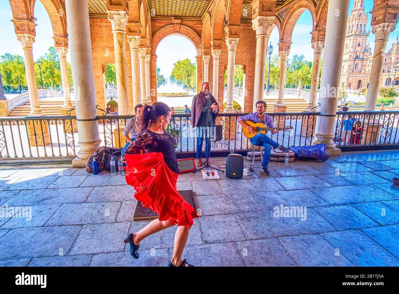 SEVILLE, SPAIN - OCTOBER 1, 2019: The emotional Andalusian flamenco dance with music accompaniment, performing on Plaza de Espana, on October 1 in Sev Stock Photo
