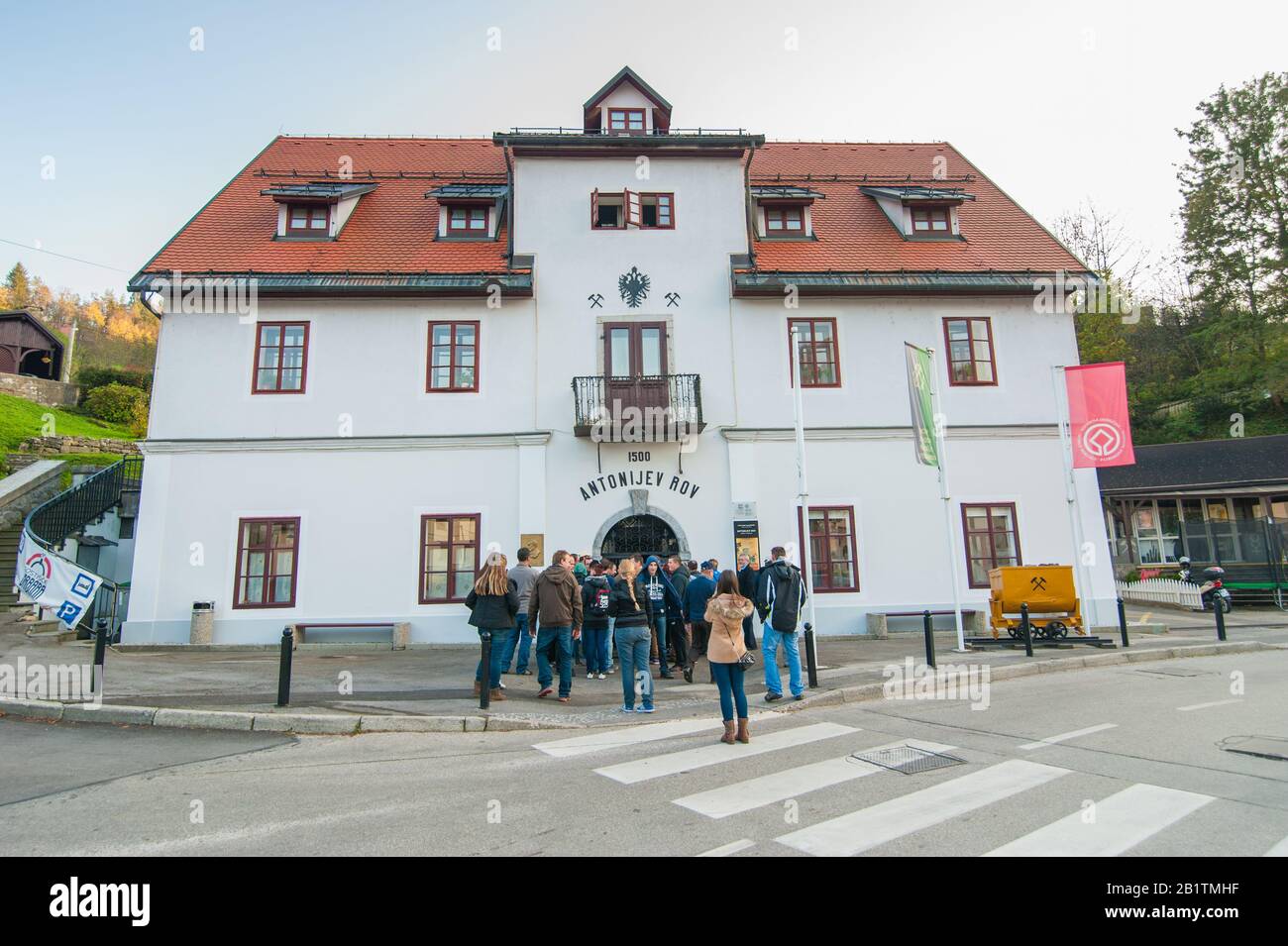 Visitors in front House of Anthony's Shaft Mining Museum in Idrija, Slovenia Stock Photo