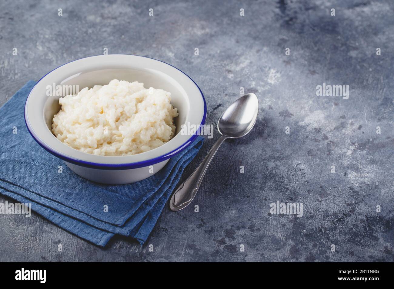 Milk rice porridge, creamy rice pudding or french riz au lait in a