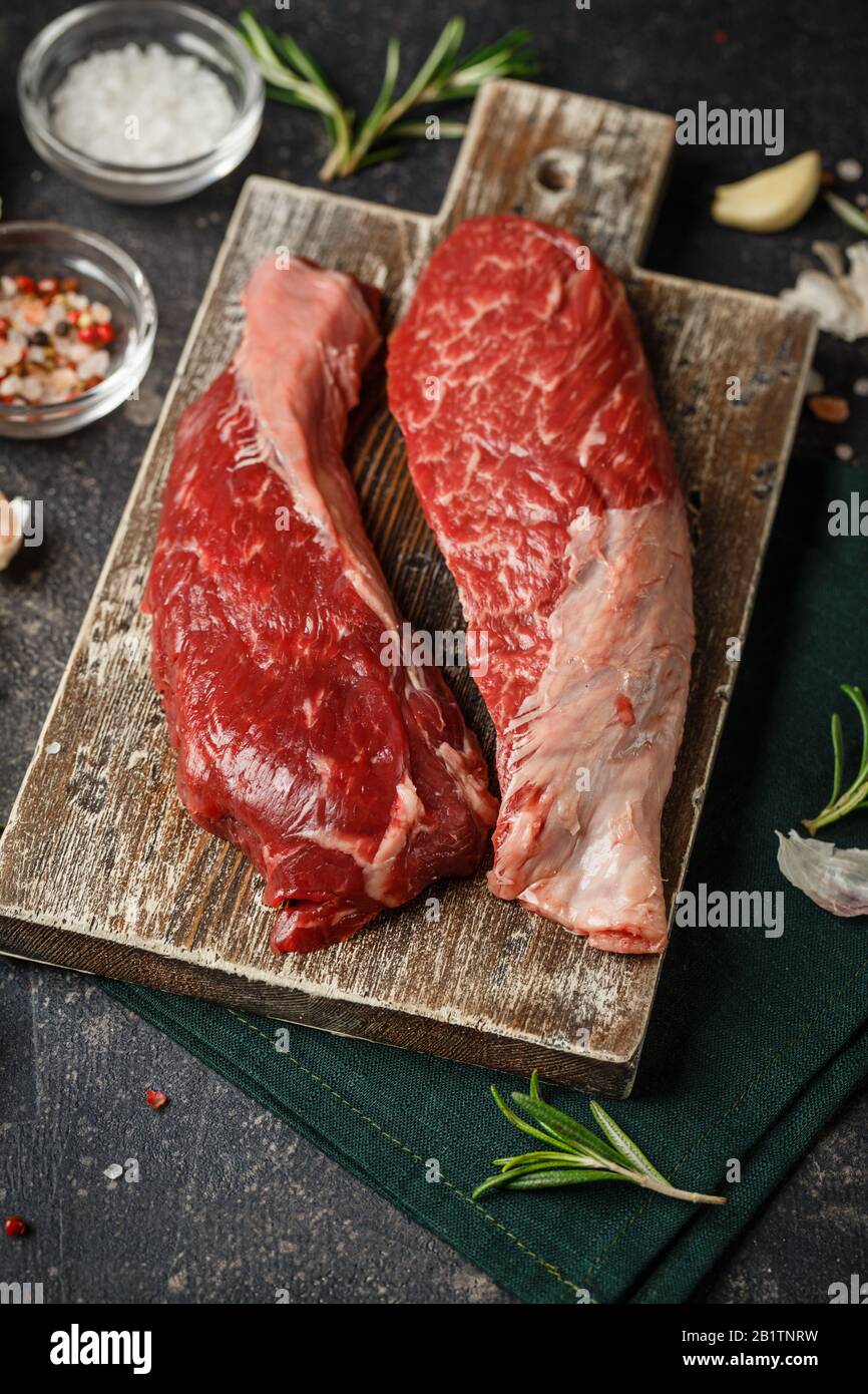 Raw Fresh Steak Sirloin Flap Served With Rosemary Garlic And Spices On Wooden Cutting Board Black Angus Beef Meat Close Up Stock Photo Alamy