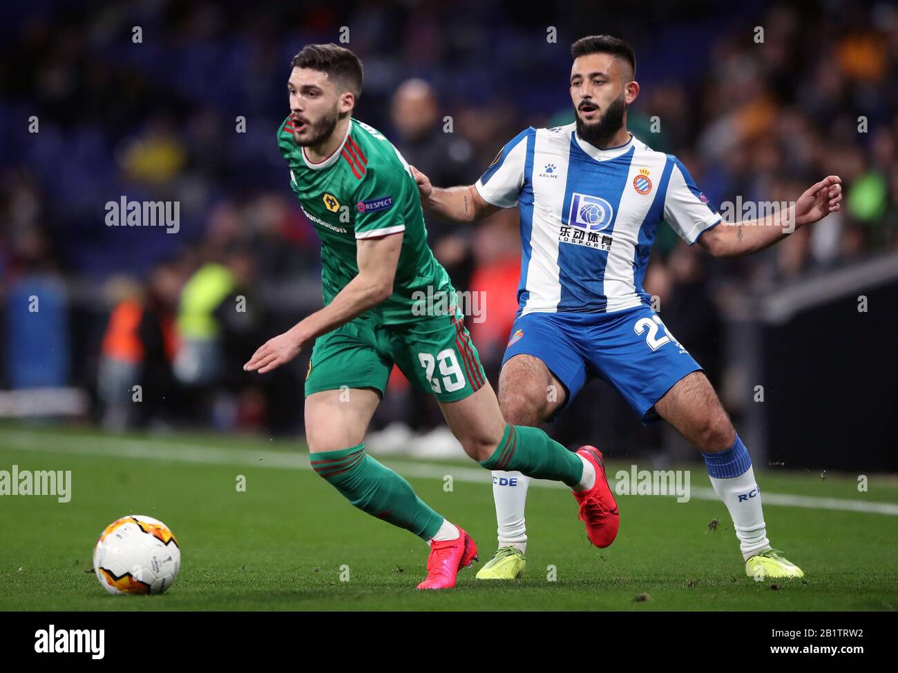 Wolverhampton Wanderers' Ruben Vinagre (left) and Espanyol's Matias Vargas battle for the ball during the Europa League match at the RCDE Stadium, Barcelona. Stock Photo