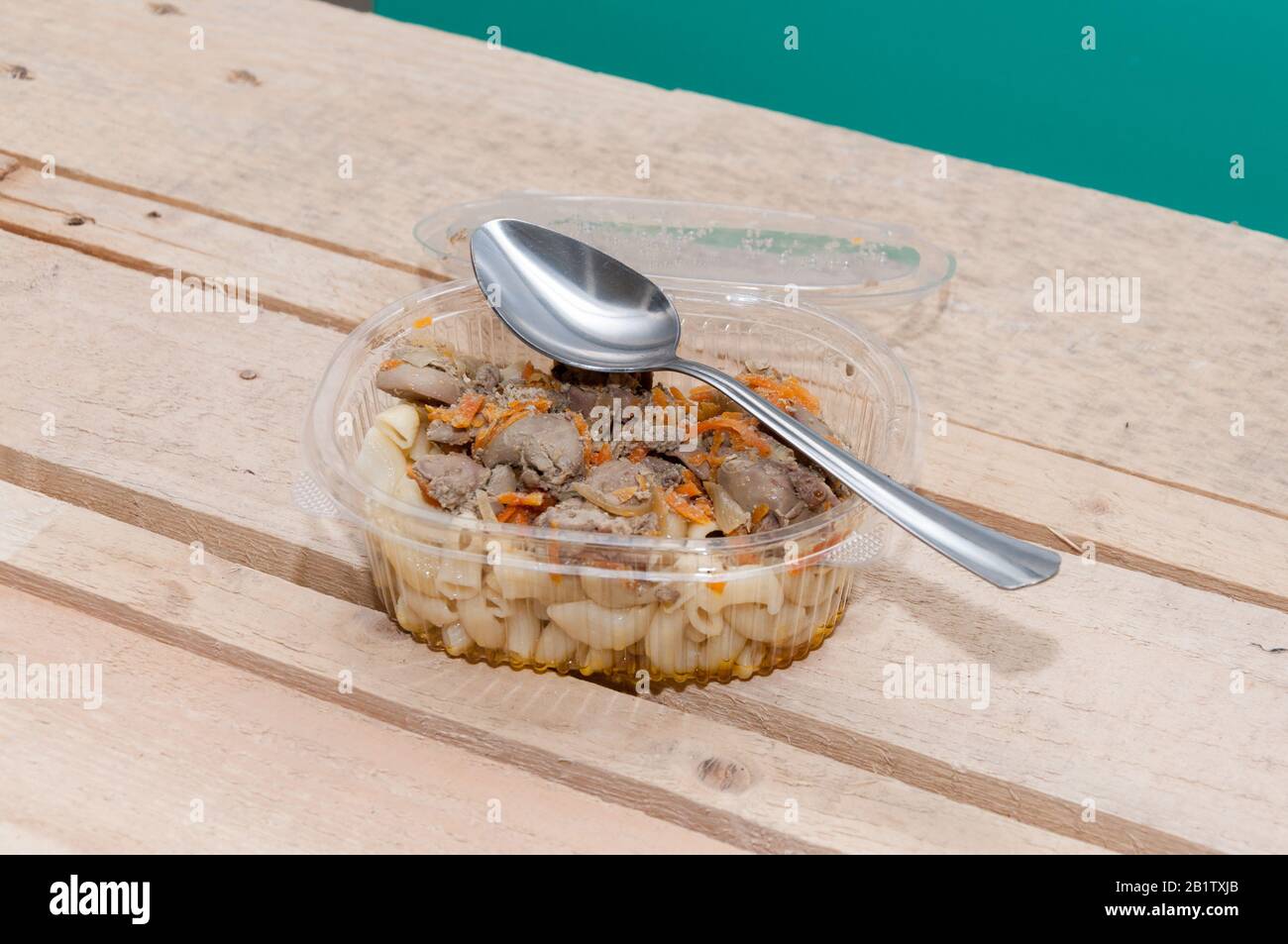 Fast food at the construction site. Food in a plastic container Stock Photo