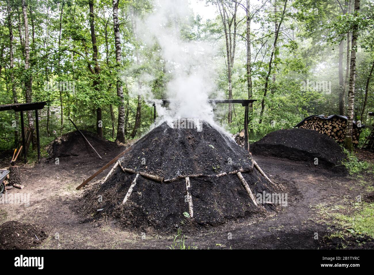 Coal kiln for the production of charcoal Stock Photo Alamy