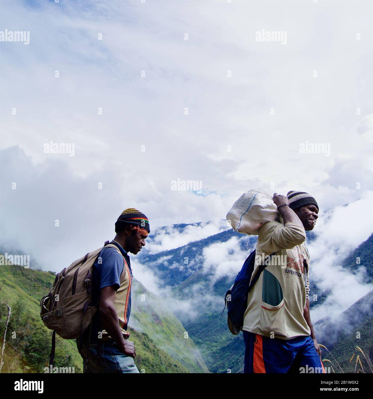 Trekking guide and porters in Baliem valley - Occidental Papua, Indonesia. Many guides in Wamena for Baliem Valley trek. Stock Photo