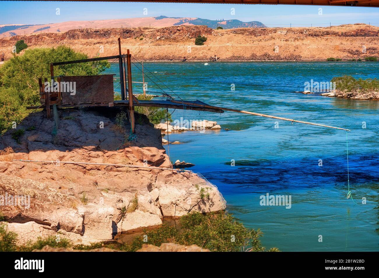 Indian fishing platforms line the shores of the Columbia River in The