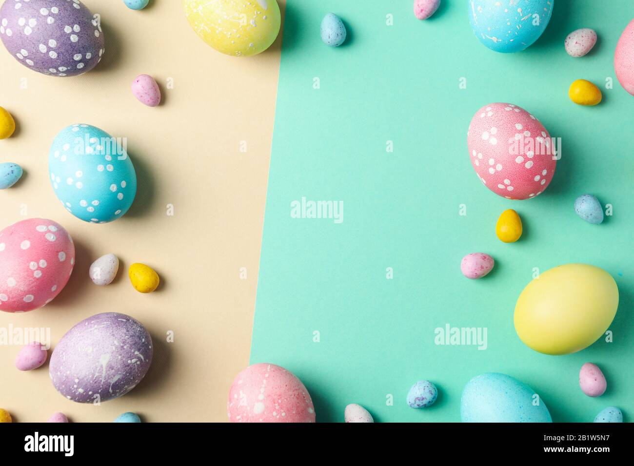 Easter eggs on two tone background, space for text Stock Photo