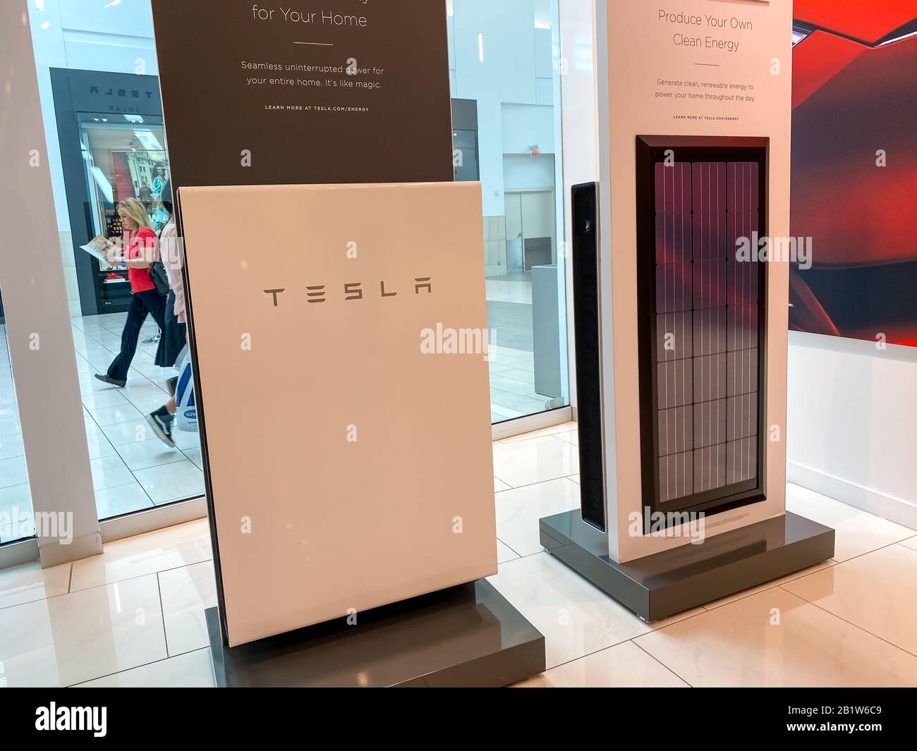Orlando, FL/USA-2/17/20: A Tesla Battery Powerwall at the Tesla dealership  in Orlando, FL. Tesla, Inc. is an American automotive and energy company t  Stock Photo - Alamy