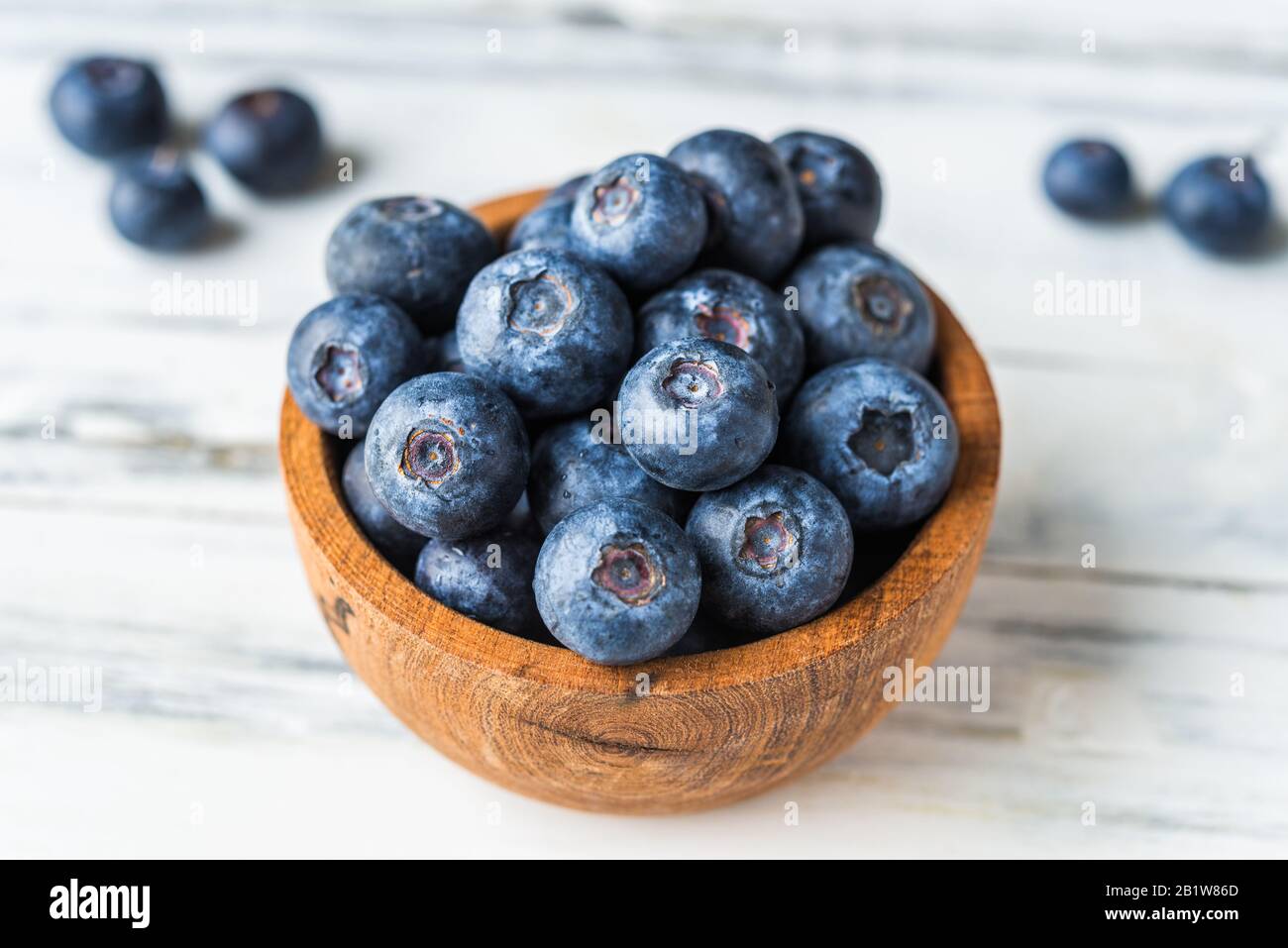 Close up of fresh organic blueberries on white background. Stock Photo