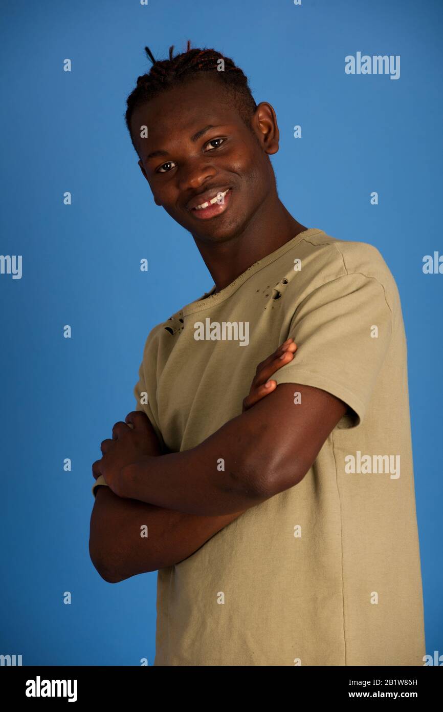 Active young man studio portrait Stock Photo - Alamy