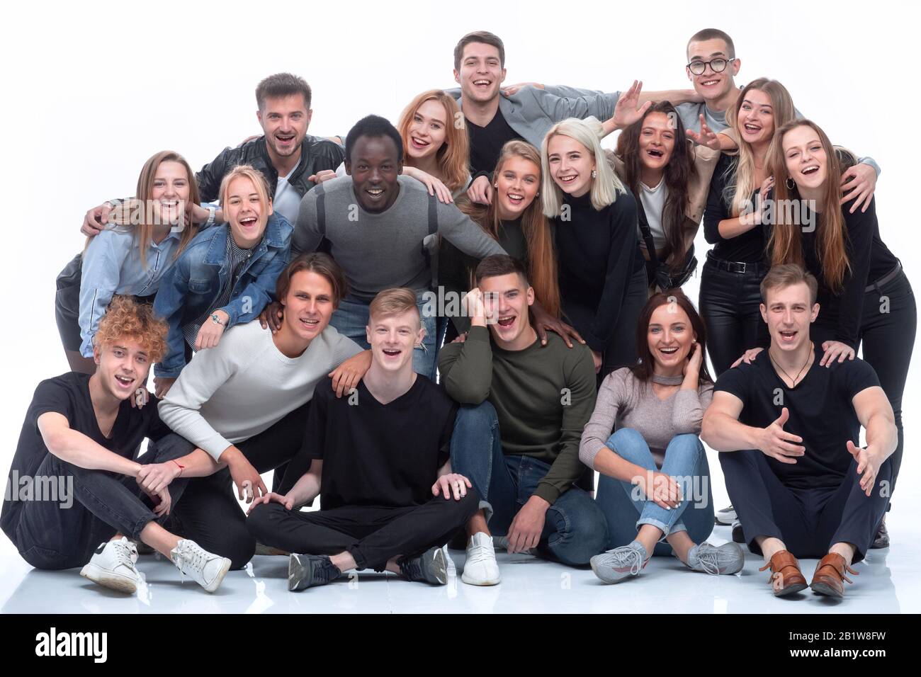 big group of friends hugging each other Stock Photo Alamy