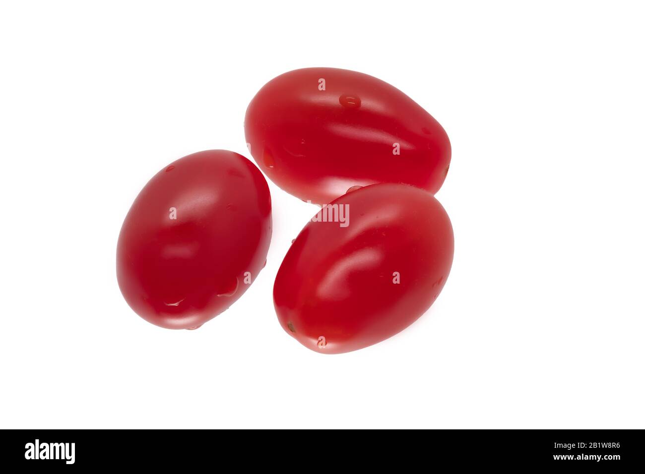 Fresh plum tomatoes on white background Stock Photo - Alamy