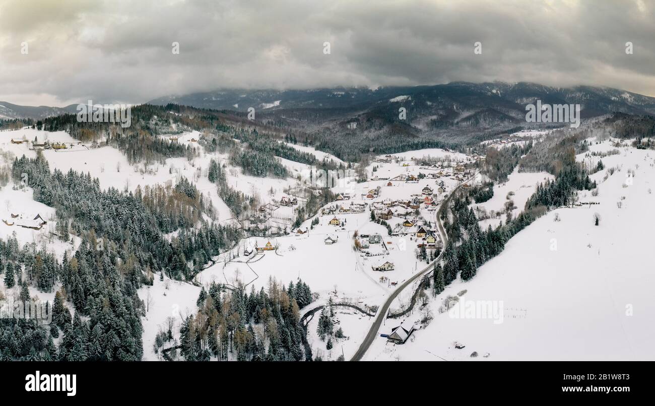 aerial View of small village in mountains in winter Stock Photo - Alamy