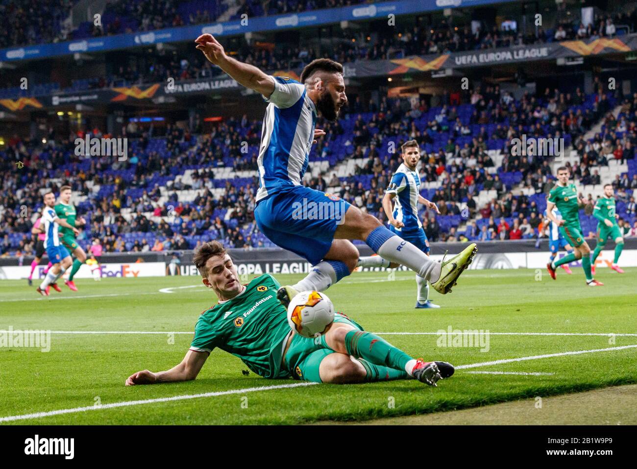 Barcelona, Spain. 27th Feb 2020.  Leander Dendoncker of Wolverhampton Wanderers F.C. in action with Matias Vargas of RCD Espanyol during the UEFA Europa League round of 32 second leg match between RCD Espanyol and Wolverhampton Wanderers at RCD Stadium on February 27, 2020 in Barcelona, Spain. Credit: Dax Images/Alamy Live News Stock Photo