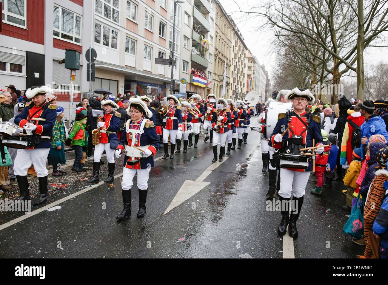Mainz, Germany. 24th February 2020. Members of the marching band of the carnival guards Bodenheimer Schoppengarde march in the the Mainz Rose Monday parade. Around half a million people lined the streets of Mainz for the traditional Rose Monday Carnival Parade. The 9 km long parade with over 9,000 participants is one of the three large Rose Monday Parades in Germany. Stock Photo