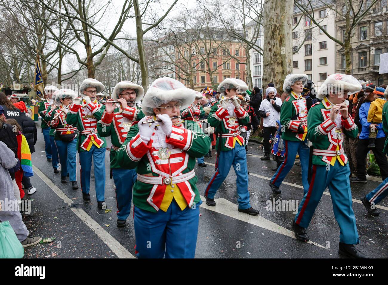 Mainz, Germany. 24th February 2020. Members of the marching band of the carnival guards Mainzer Freischuetzengarde march in the Mainz Rose Monday parade. Around half a million people lined the streets of Mainz for the traditional Rose Monday Carnival Parade. The 9 km long parade with over 9,000 participants is one of the three large Rose Monday Parades in Germany. Stock Photo