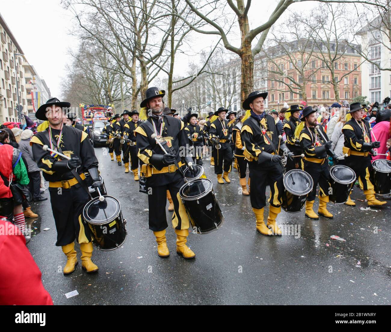 Mainz, Germany. 24th February 2020. Members of the fanfare band Fanfarenzug Bad Wurzach march in the Mainz Rose Monday parade. Around half a million people lined the streets of Mainz for the traditional Rose Monday Carnival Parade. The 9 km long parade with over 9,000 participants is one of the three large Rose Monday Parades in Germany. Stock Photo