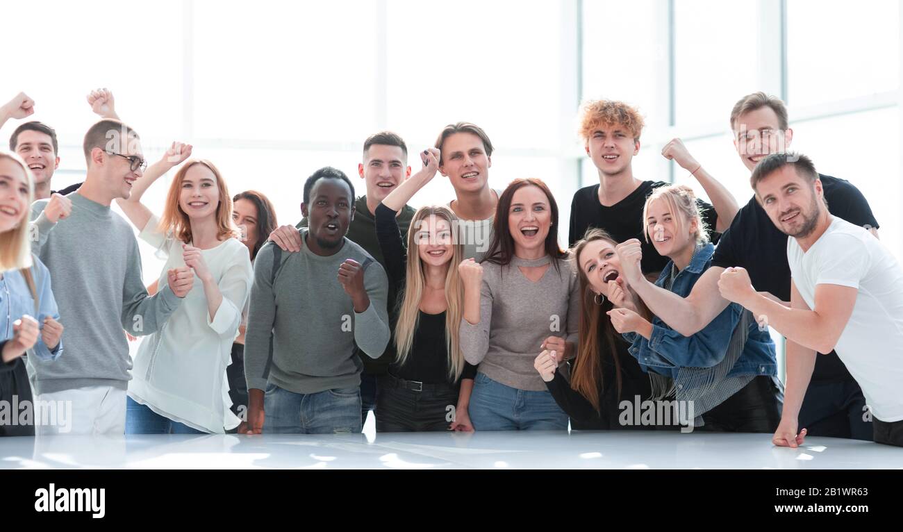large group of happy young people standing together Stock Photo - Alamy