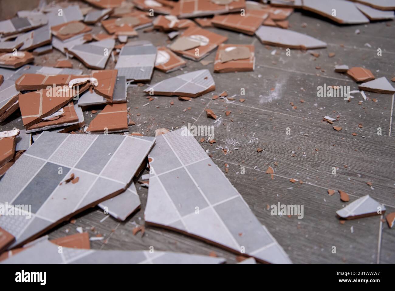 Pile of broken ceramic tiles remains after bathroom renovation prepared