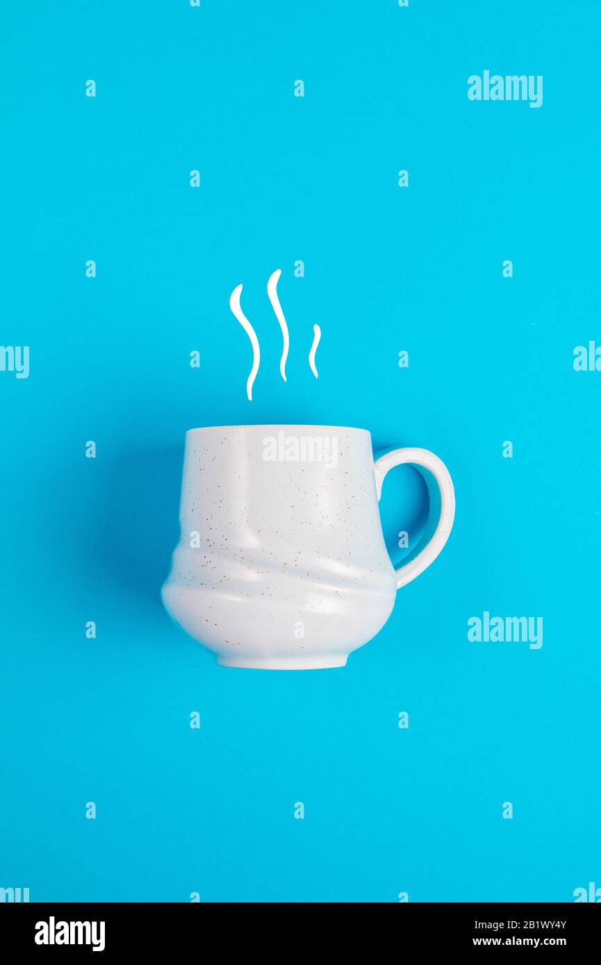 Coffee mug with smoke graphics on a blue background Stock Photo Alamy