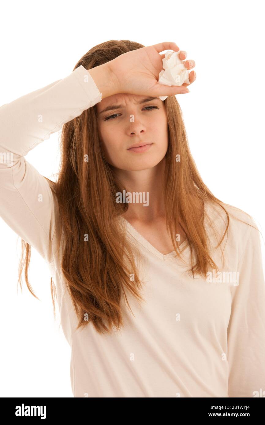 Upset young woman suffering from influenza at home  . Stock Photo