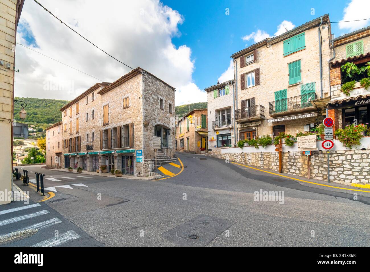 A typical street just outside the medieval walled village of Tourrettes Sur Loup, France, in the Alpes-Maritimes commune of Southern France. Stock Photo