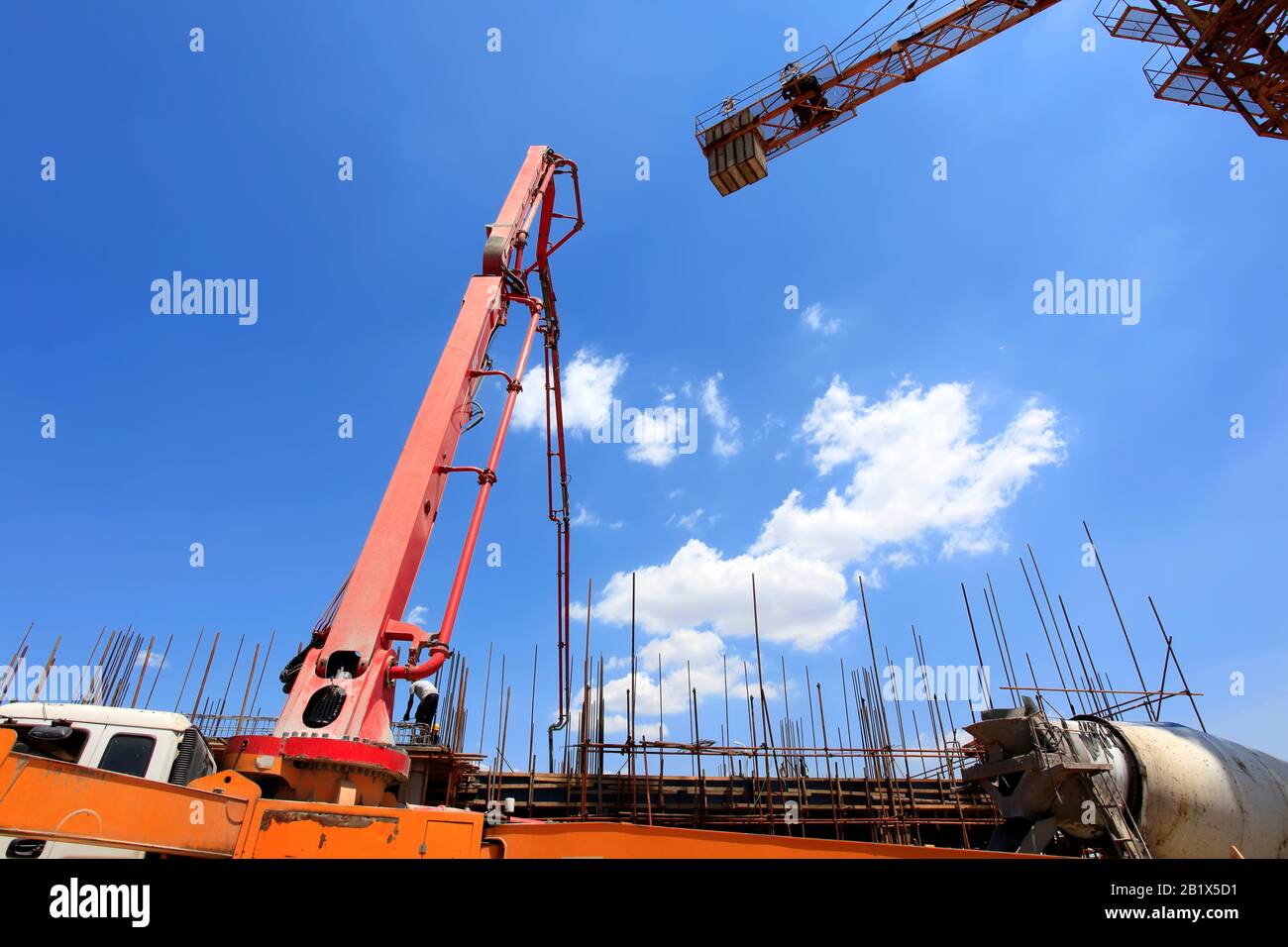 Construction site under the blue sky white clouds Stock Photo - Alamy