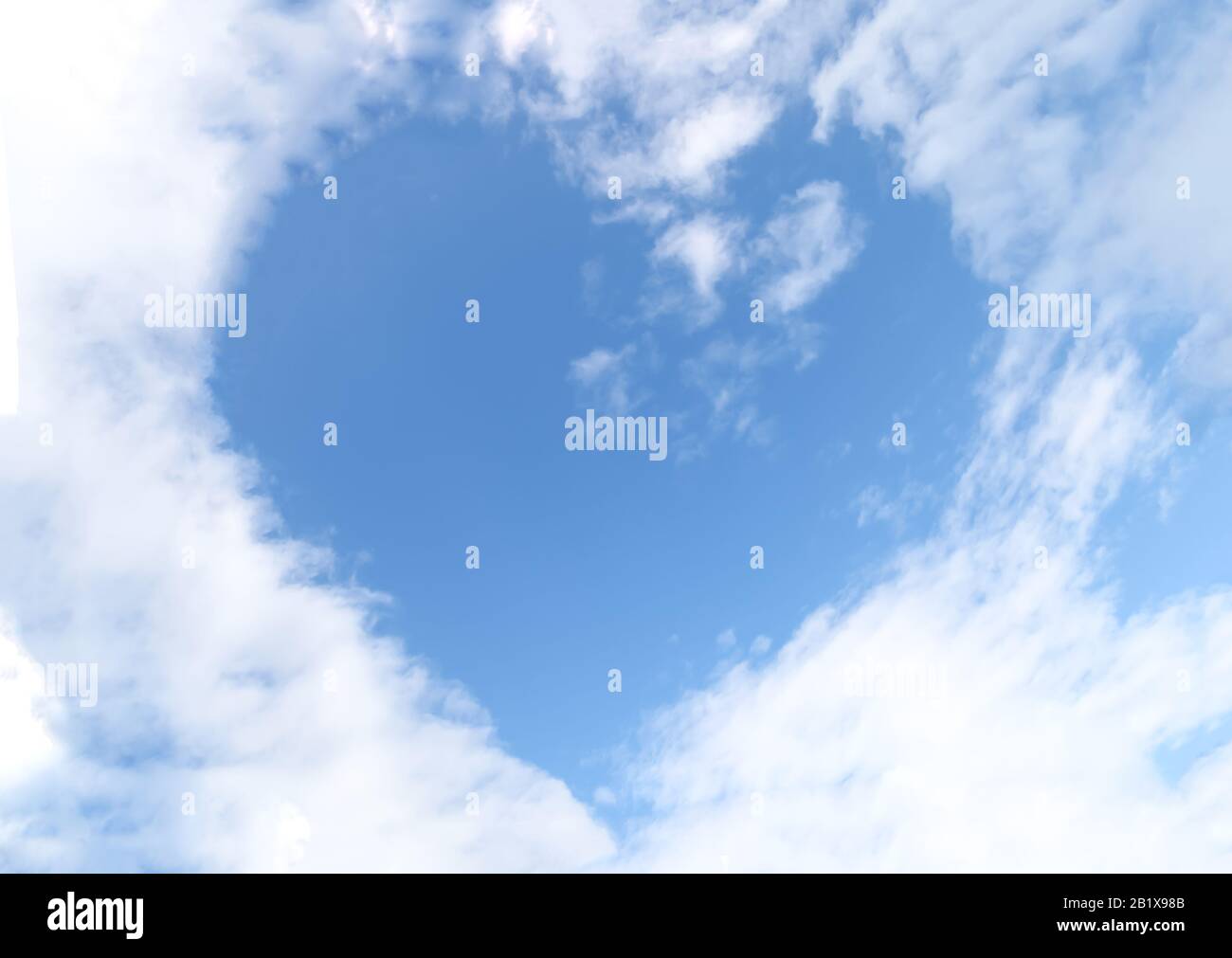 Blue sky with hearts shape clouds. Beauty natural background Stock ...