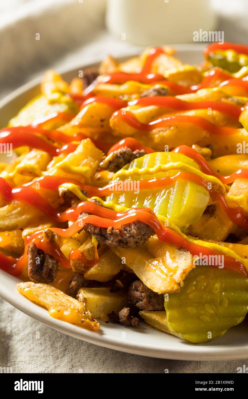 Homemade Loaded Cheeseburger Cheese Fries with PIckles and Ketchup