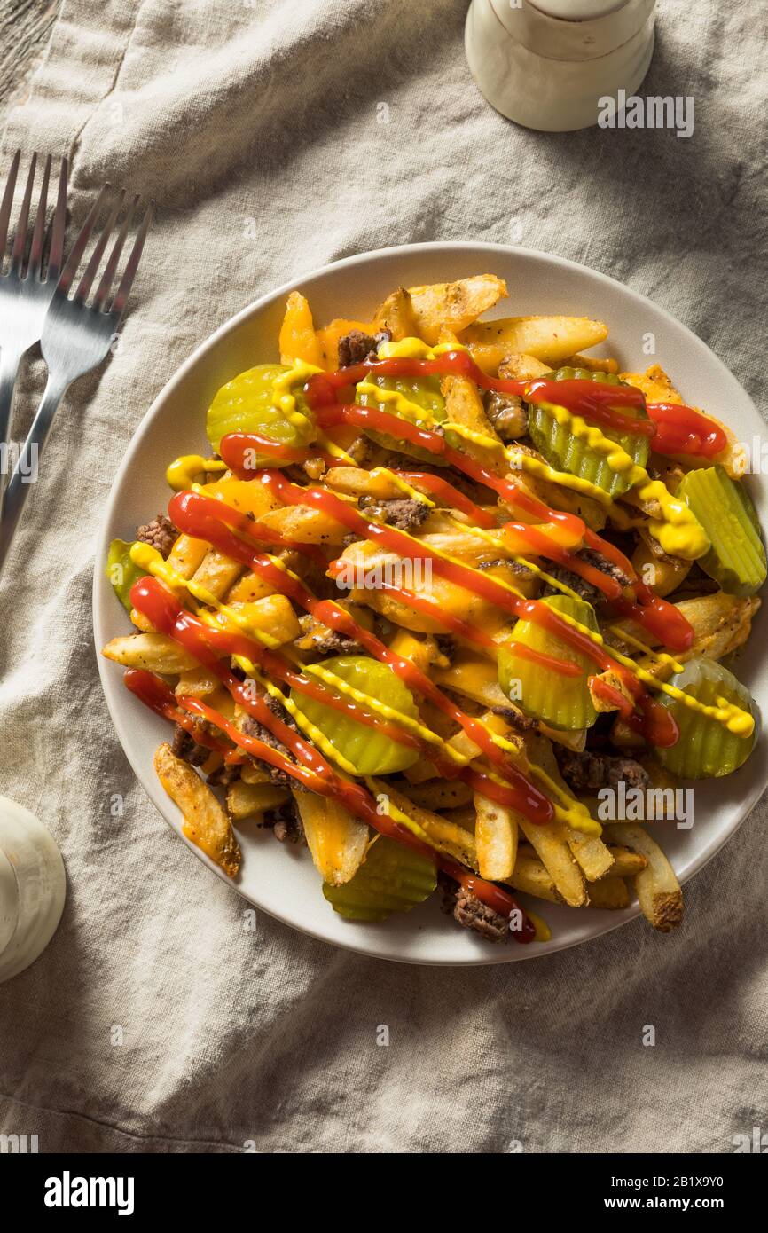 Homemade Loaded Cheeseburger Cheese Fries with PIckles and Ketchup