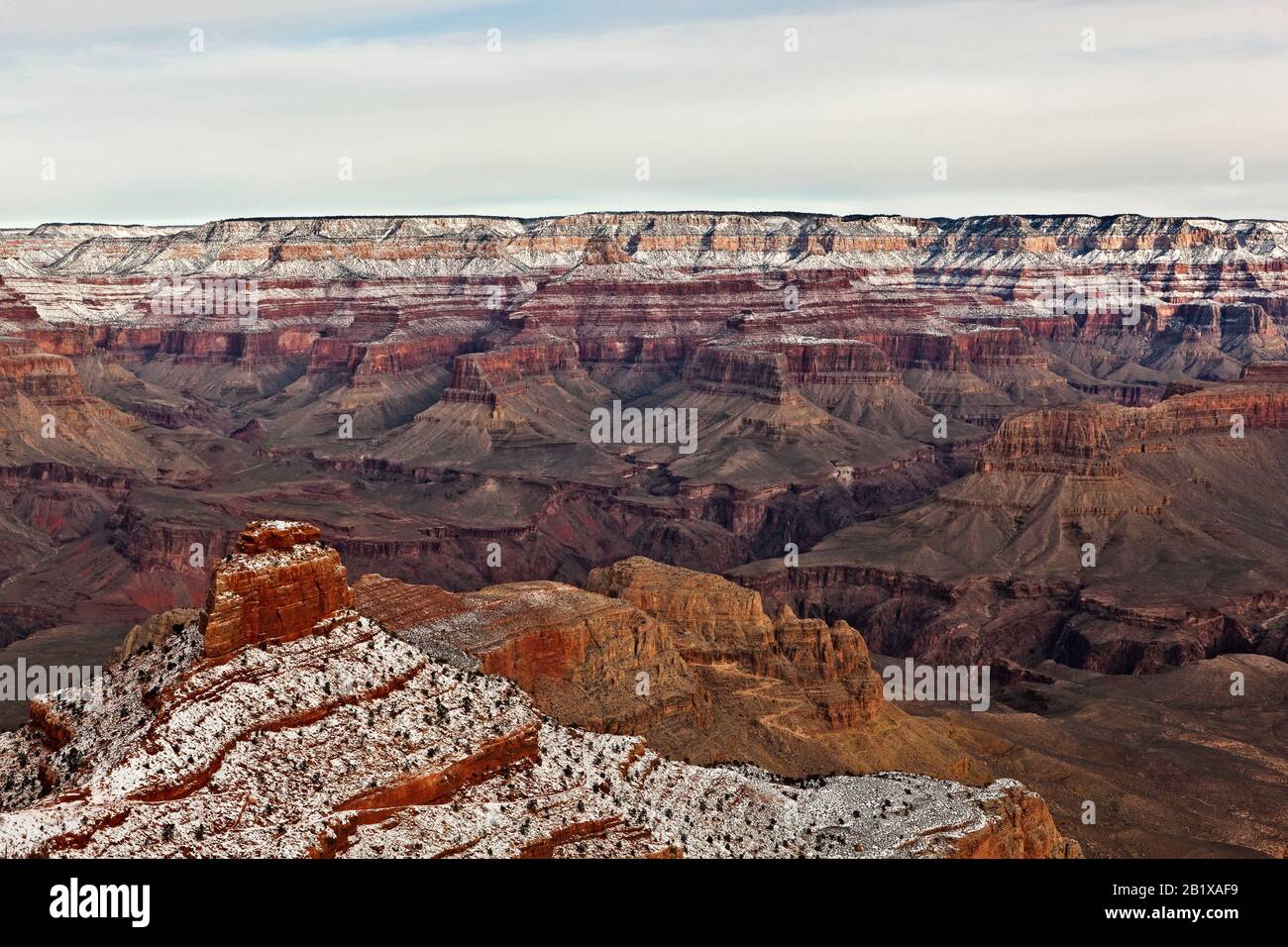 Morning Sun on O'Neill Butte, the Inner Gorge, and the North Rim of the Grand Canyon, with a dusting of winter snow Stock Photo