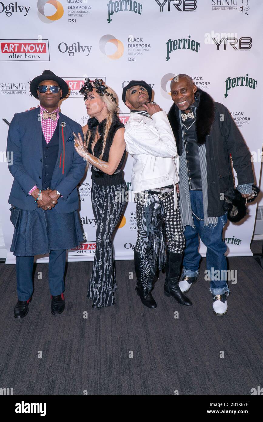 New York, USA. 27th Feb, 2020. Jonn Nubian, Luciana Pampalone, Popstar Aaron Paul and Michael Anthony Pegues attend Art Now After Hours: Exhibition Celebrating Black History and Culture by Ogilvy Black Diaspora & YRB Magazine at 63611th Ave in New York, NY on February 27, 2020. (Photo by David Warren /Sipa? USA) Credit: Sipa USA/Alamy Live News Stock Photo