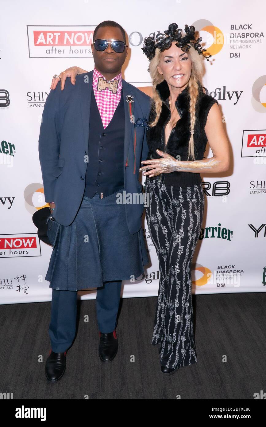 New York, USA. 27th Feb, 2020. Jonn Nubian and Luciana Pampalone attend Art Now After Hours: Exhibition Celebrating Black History and Culture by Ogilvy Black Diaspora & YRB Magazine at 63611th Ave in New York, NY on February 27, 2020. (Photo by David Warren /Sipa? USA) Credit: Sipa USA/Alamy Live News Stock Photo