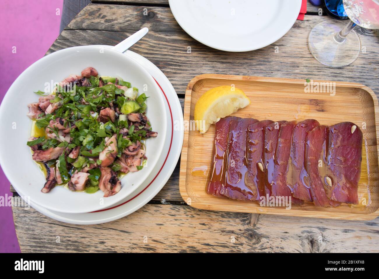 Lisbon traditional sea food sardins, anchovies, octopus and tuna dried meat served as tapas at