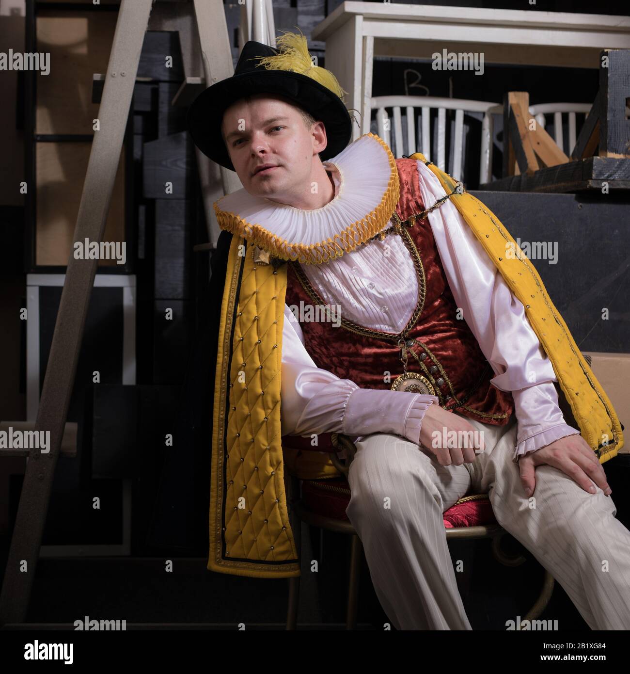 Actor dressed historical costume in interior of old theater Stock Photo ...