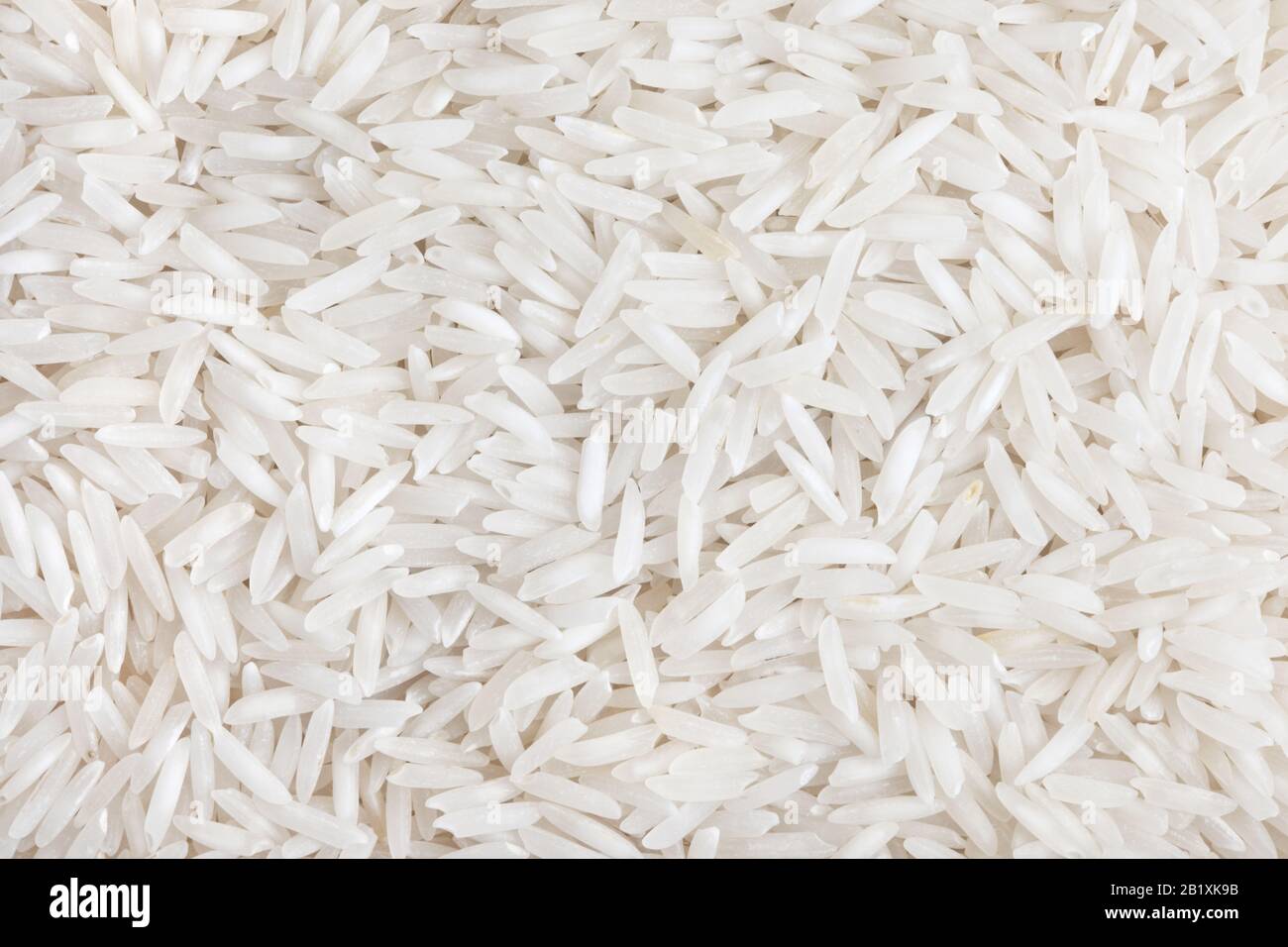 Rice white long-grain texture background. Indian basmati rise Stock ...