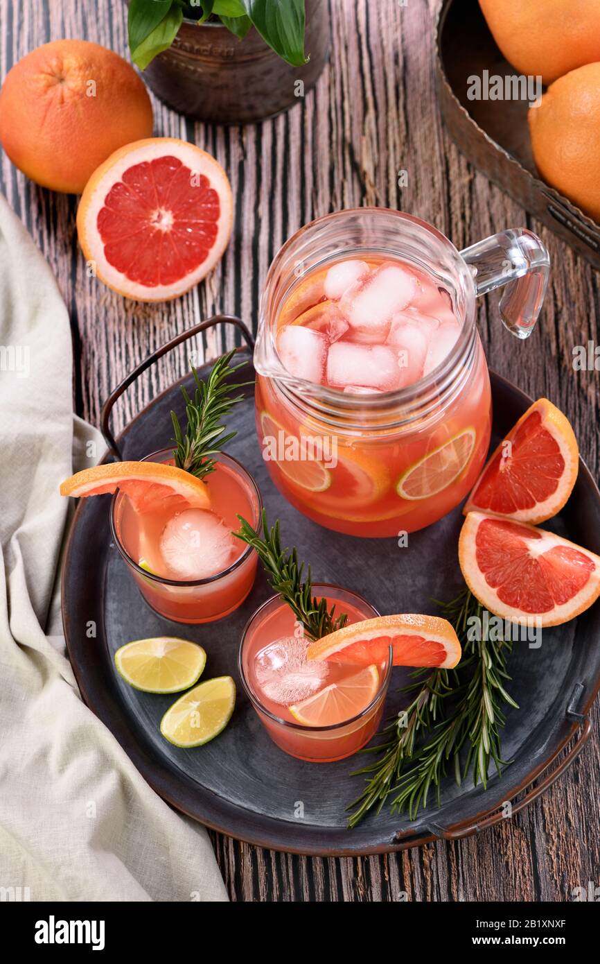 Fresh grapefruit cocktail. Fresh summer cocktail with grapefruit, lime