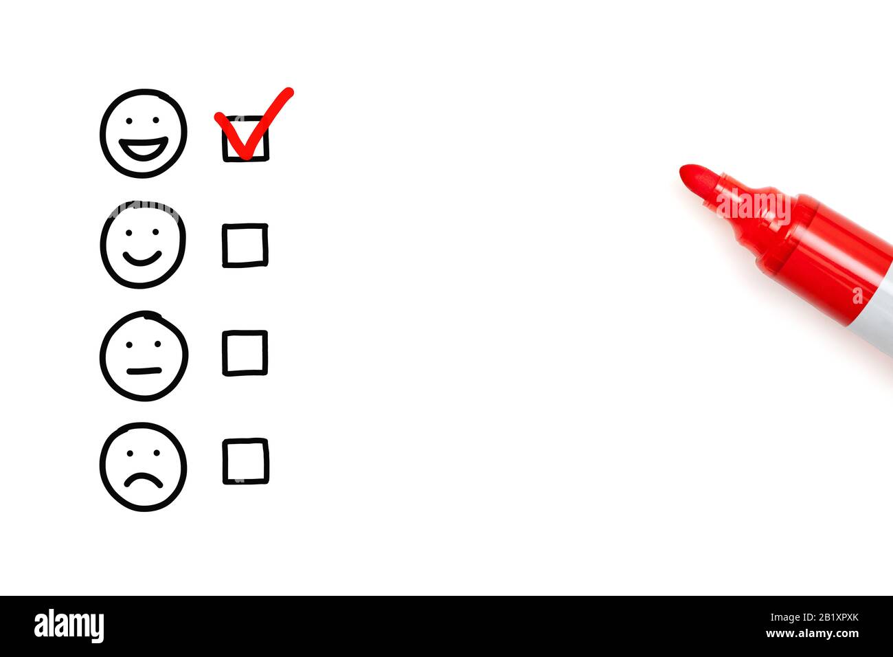 Red check mark on blank awesome survey checklist next to handdrawn happy face on white background. Stock Photo