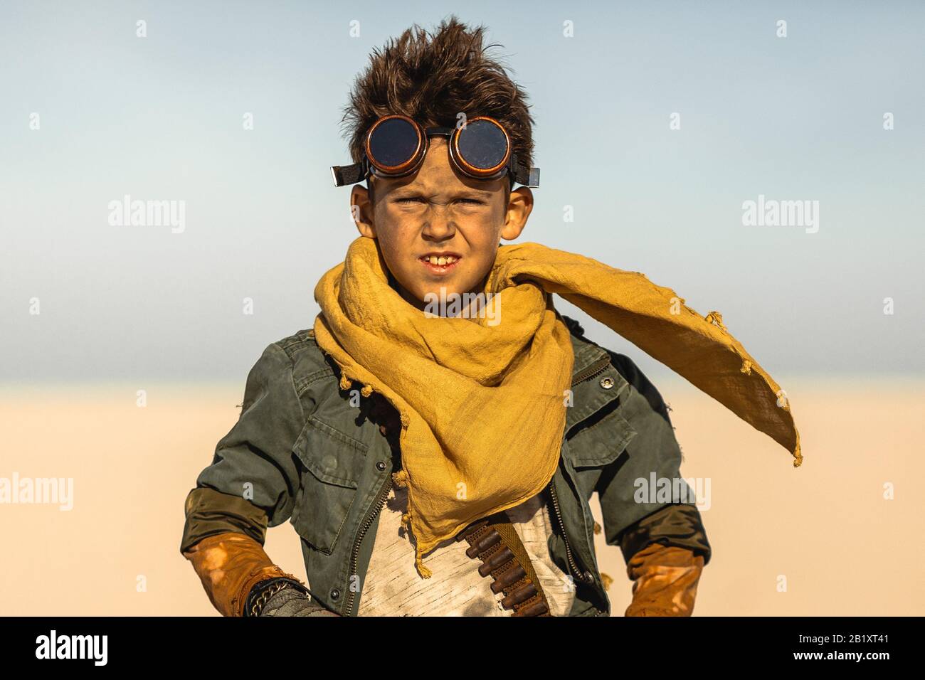 A post apocalyptic boy outdoors in desert. Nuclear post apocalypse