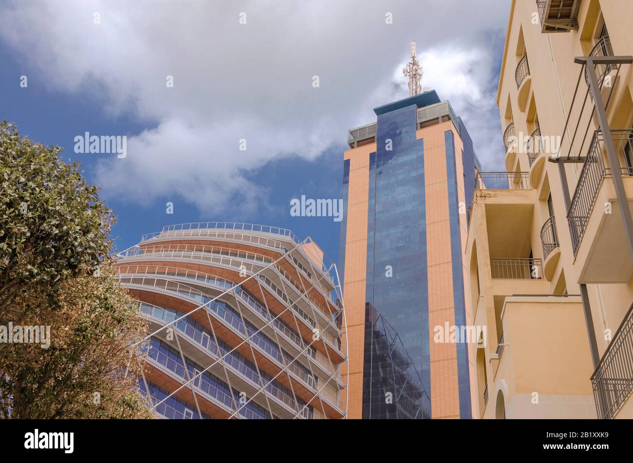 Paola, Malta; April 15, 2019: Street of Paola district - modern architecture with a ship inspired building facade Stock Photo