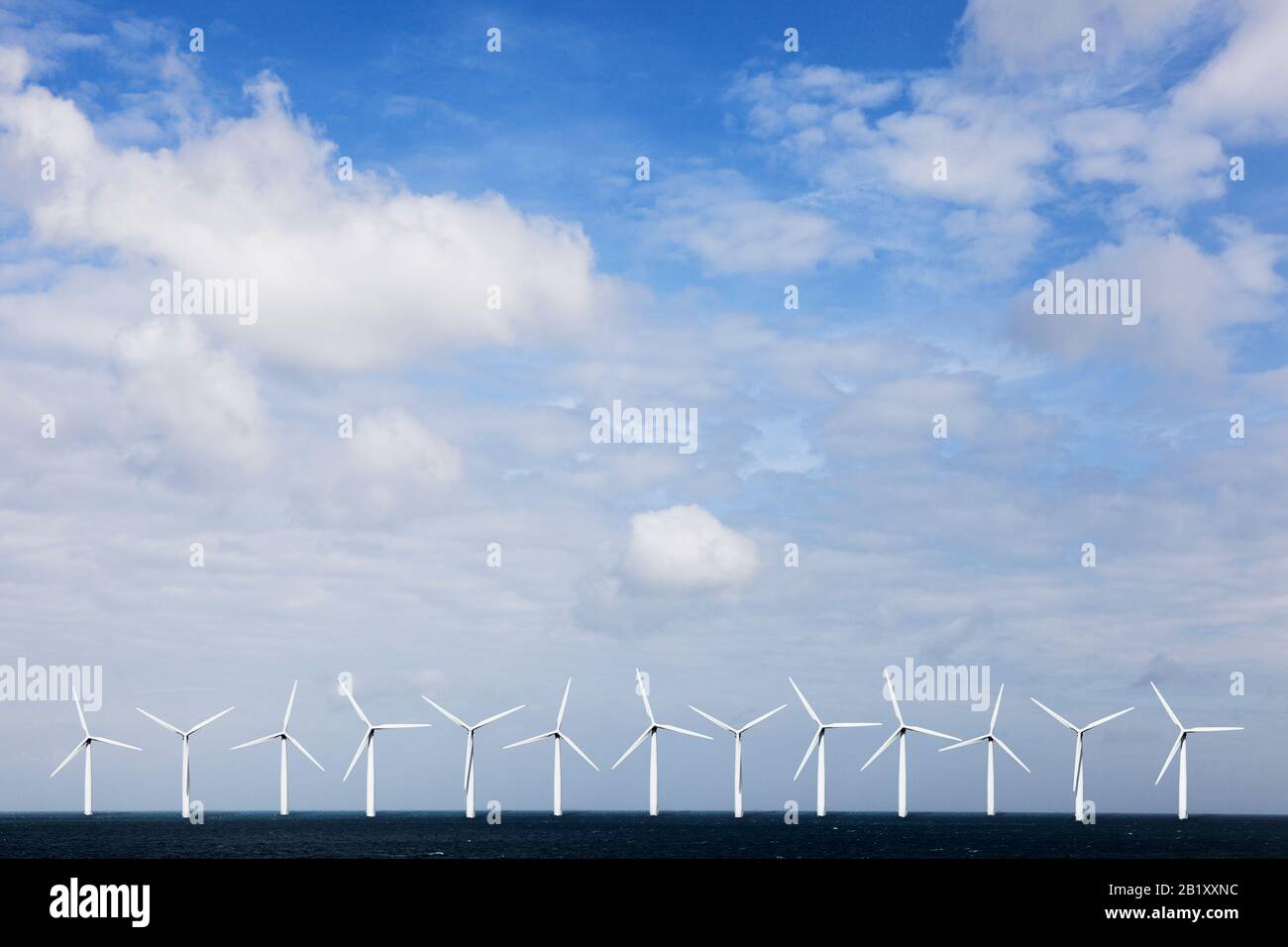 Offshore wind farm, wind turbines at sea, (digital composite) Stock Photo
