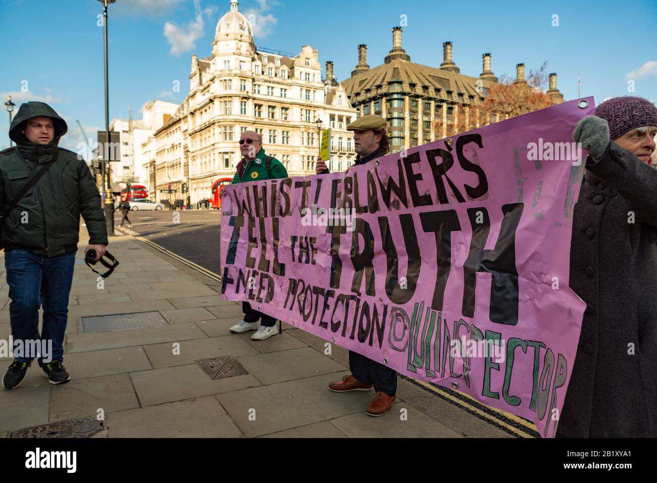 Whistle blowers tell the truth, banner. Westminster, UK Stock Photo Alamy