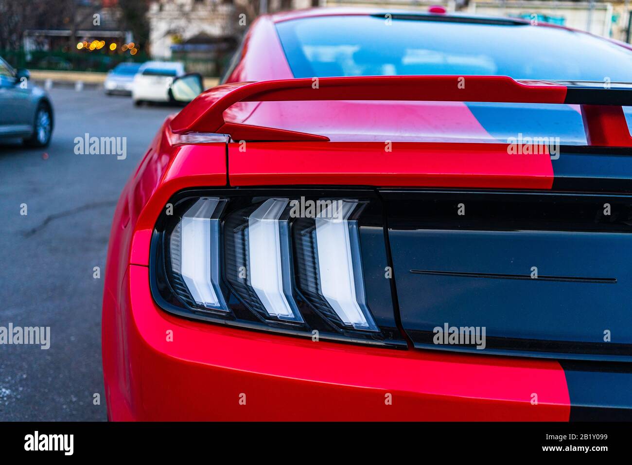 Details of modern car Ford Mustang GT. Backlights of car modern luxury