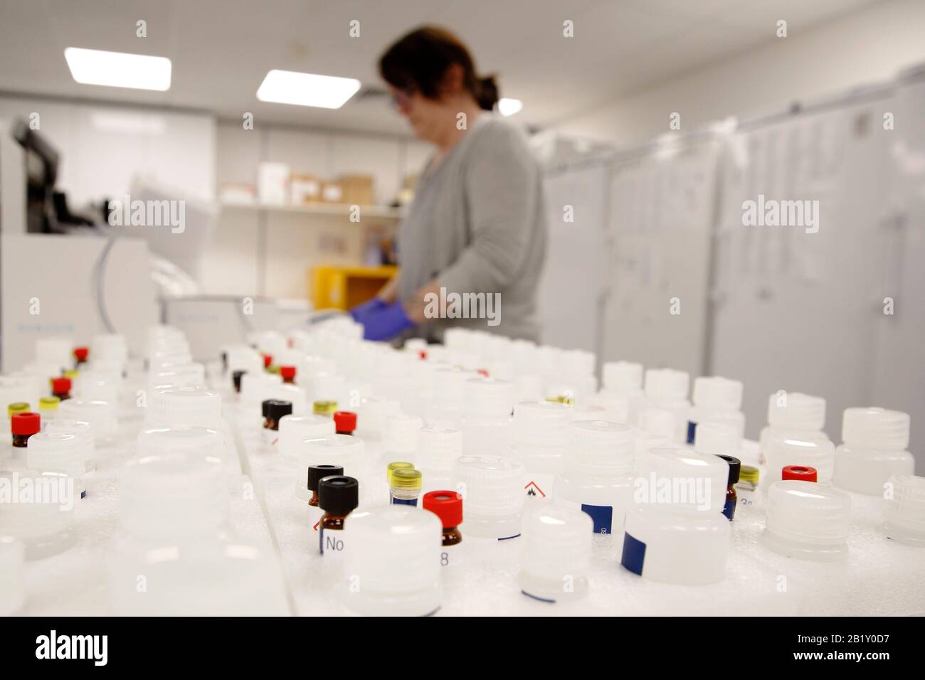 A dispatch assistant packs extraction kits, for taking rna and dna swabs for identification of the presence of coronavirus, at the Primerdesign office Stock Photo