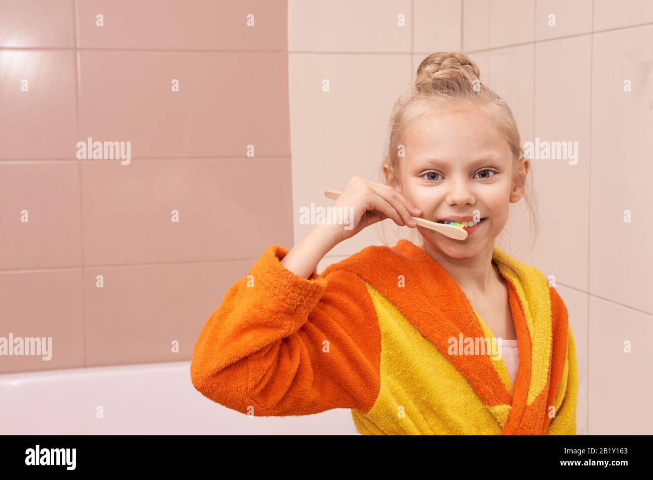 Young girl dental care. Child wash teeth Stock Photo