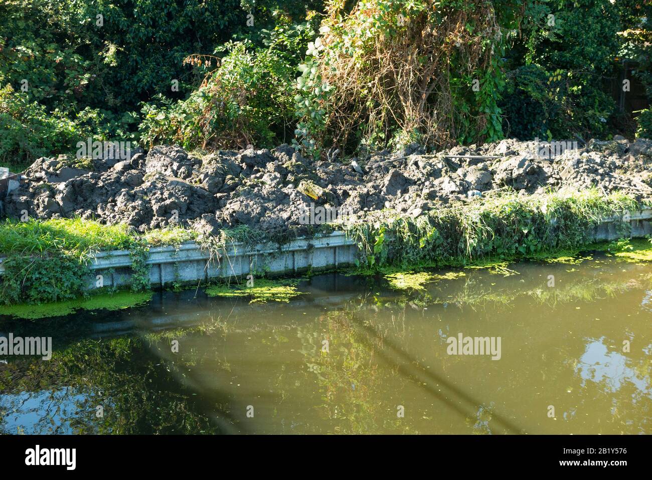 The Longford River with its artificial riverbank built up with newly