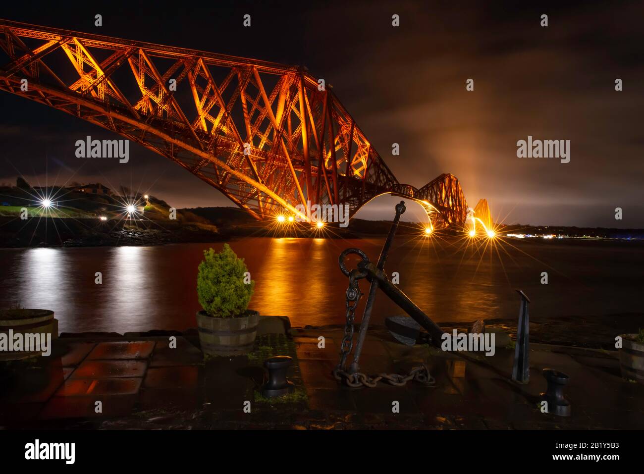 Iconic Forth Rail Bridge at night with lighting Stock Photo