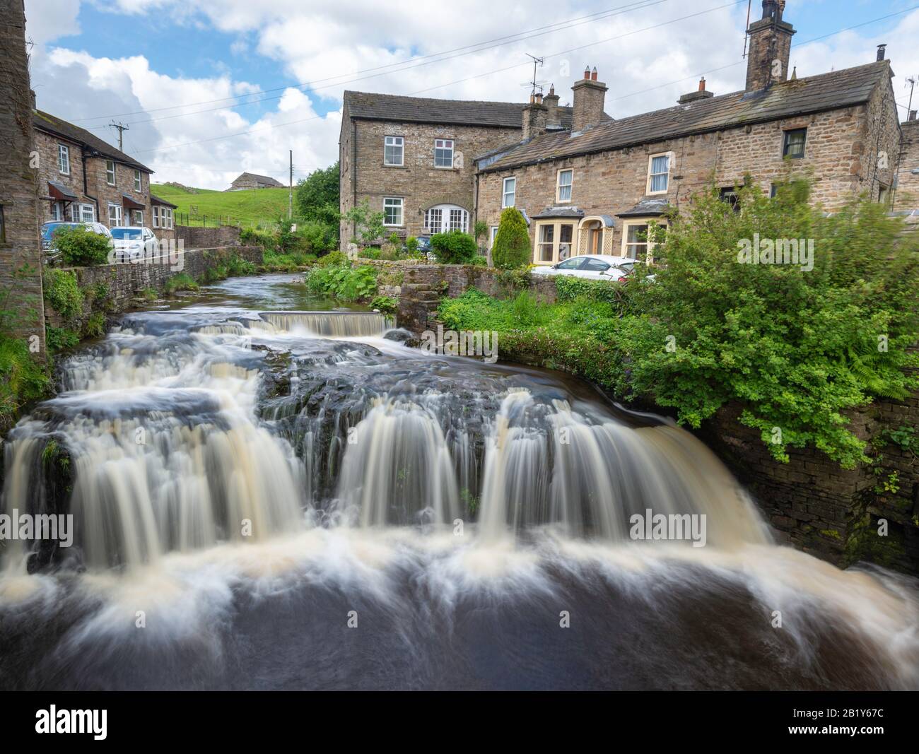 Waterfall on Gayle Beck in the centre of the Yorkshire dales town of Hawes, Wensleydale Stock Photo