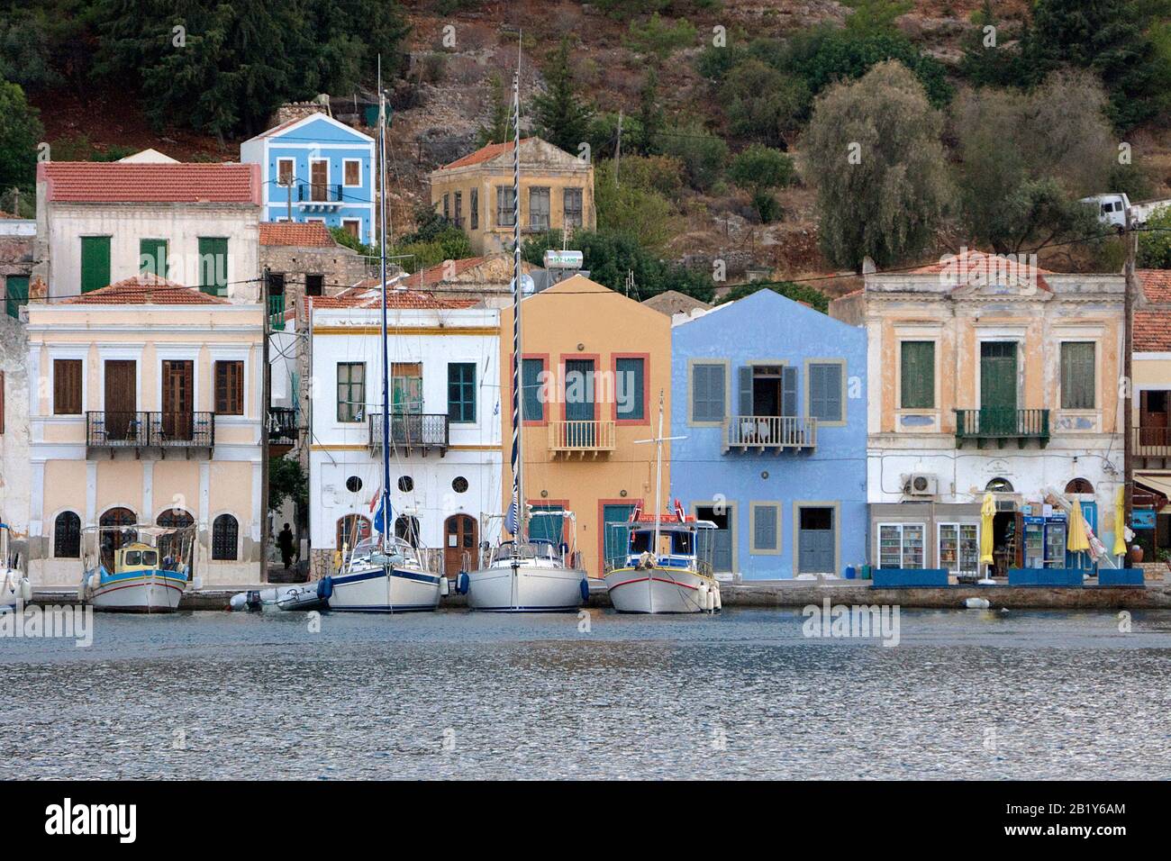 Evening mood at Meis island, also known as Kastellorizo, boats in the harbour, Meis island, Greece Stock Photo