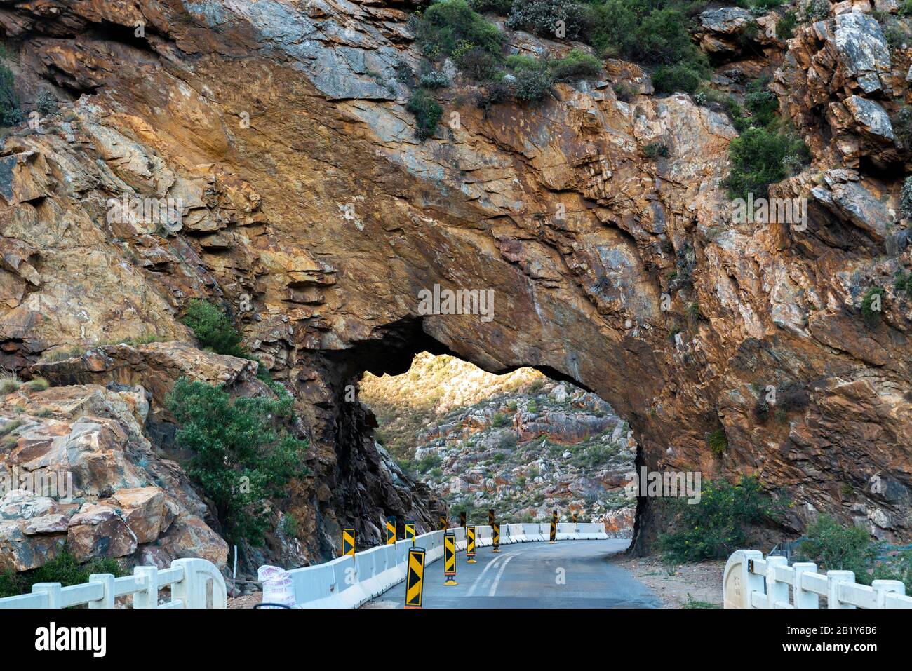 Solid rock tunnel on Cogmanskloof Pass a mountain pass in Western Cape, South Africa, on the R62 provincial road over the Langeberg Stock Photo